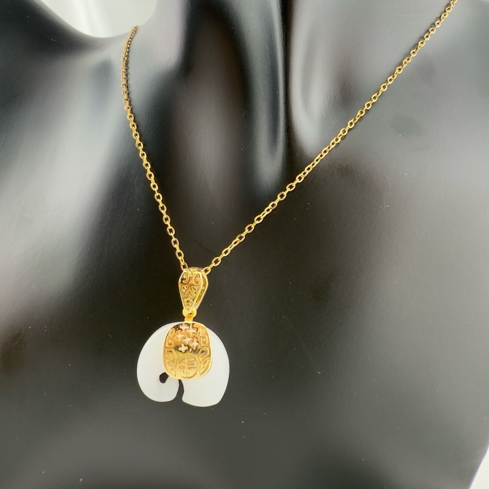Anthropologie Gold and White Elephant Pendant Necklace